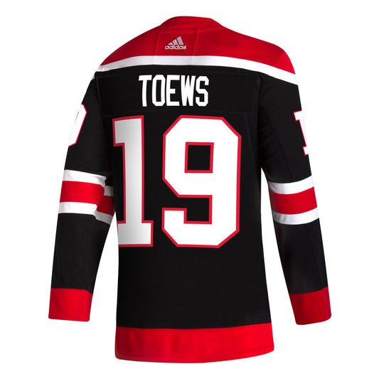 Men's Chicago Blackhawks Jonathan Toews adidas Black Reverse Retro Premium Twill Authentic Team Jersey